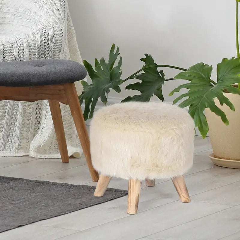 Moderner runder, gepolsterter Ottoman-Fußhocker