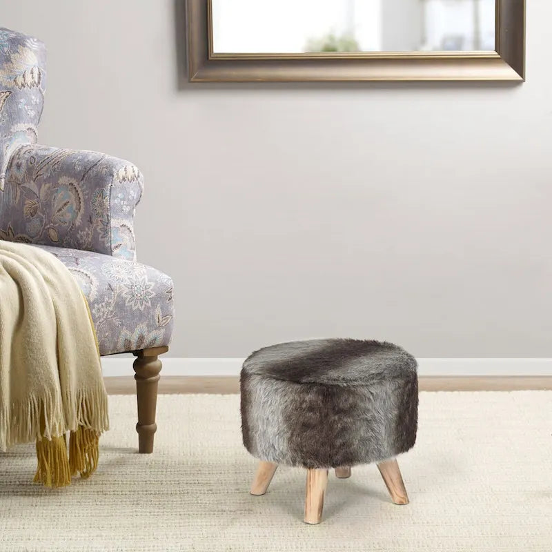 Moderner runder, gepolsterter Ottoman-Fußhocker