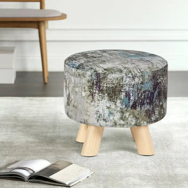 Moderner runder, gepolsterter Ottoman-Fußhocker