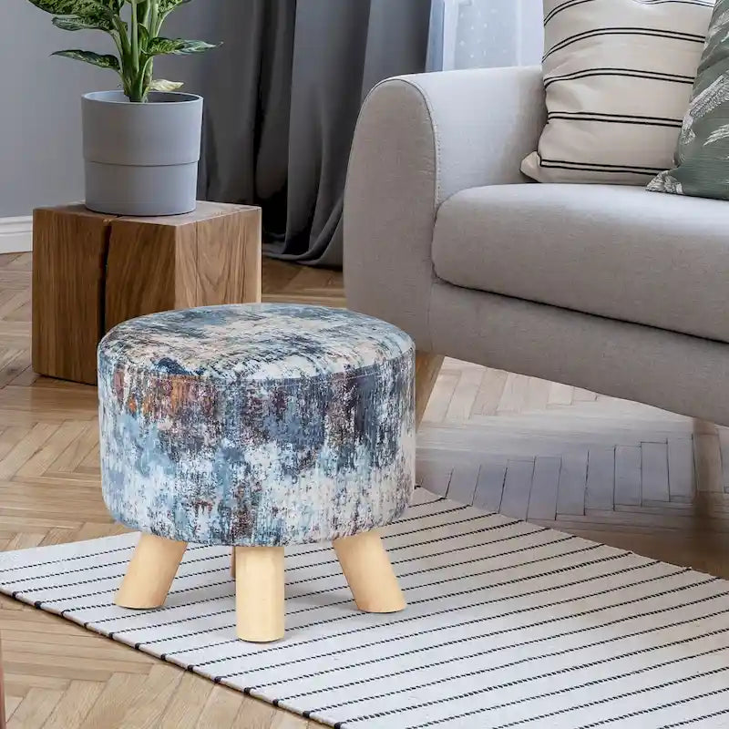 Moderner runder, gepolsterter Ottoman-Fußhocker