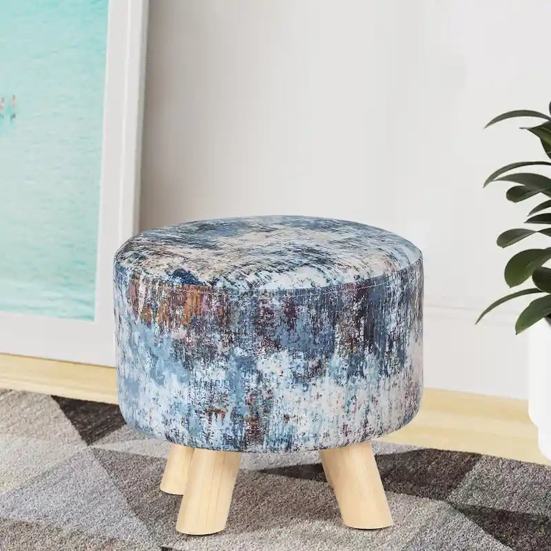 Moderner runder, gepolsterter Ottoman-Fußhocker